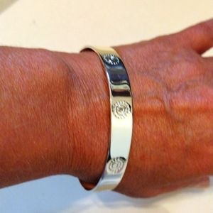 Pieces Of Me silver band bracelet.